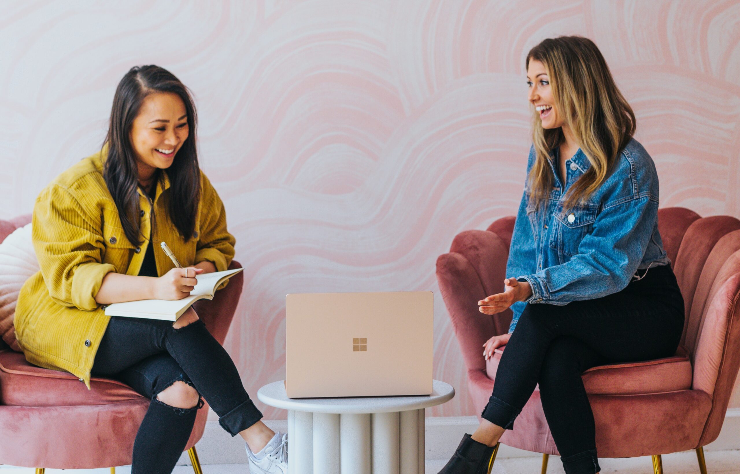 2 women smiling social distancing