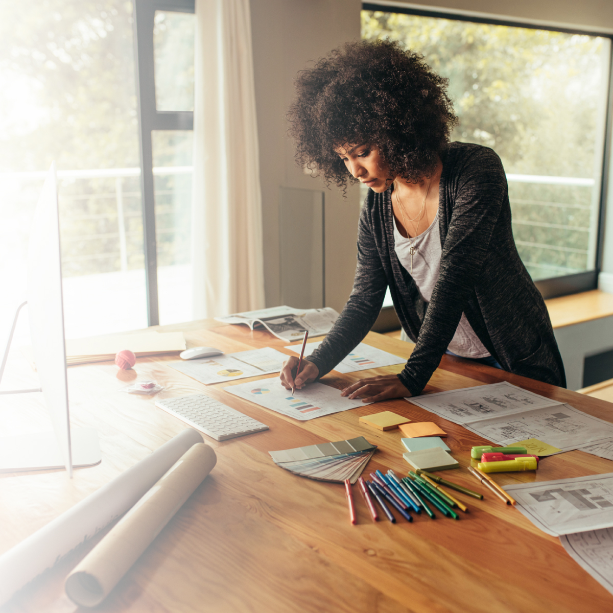 Women works from her kitchen table